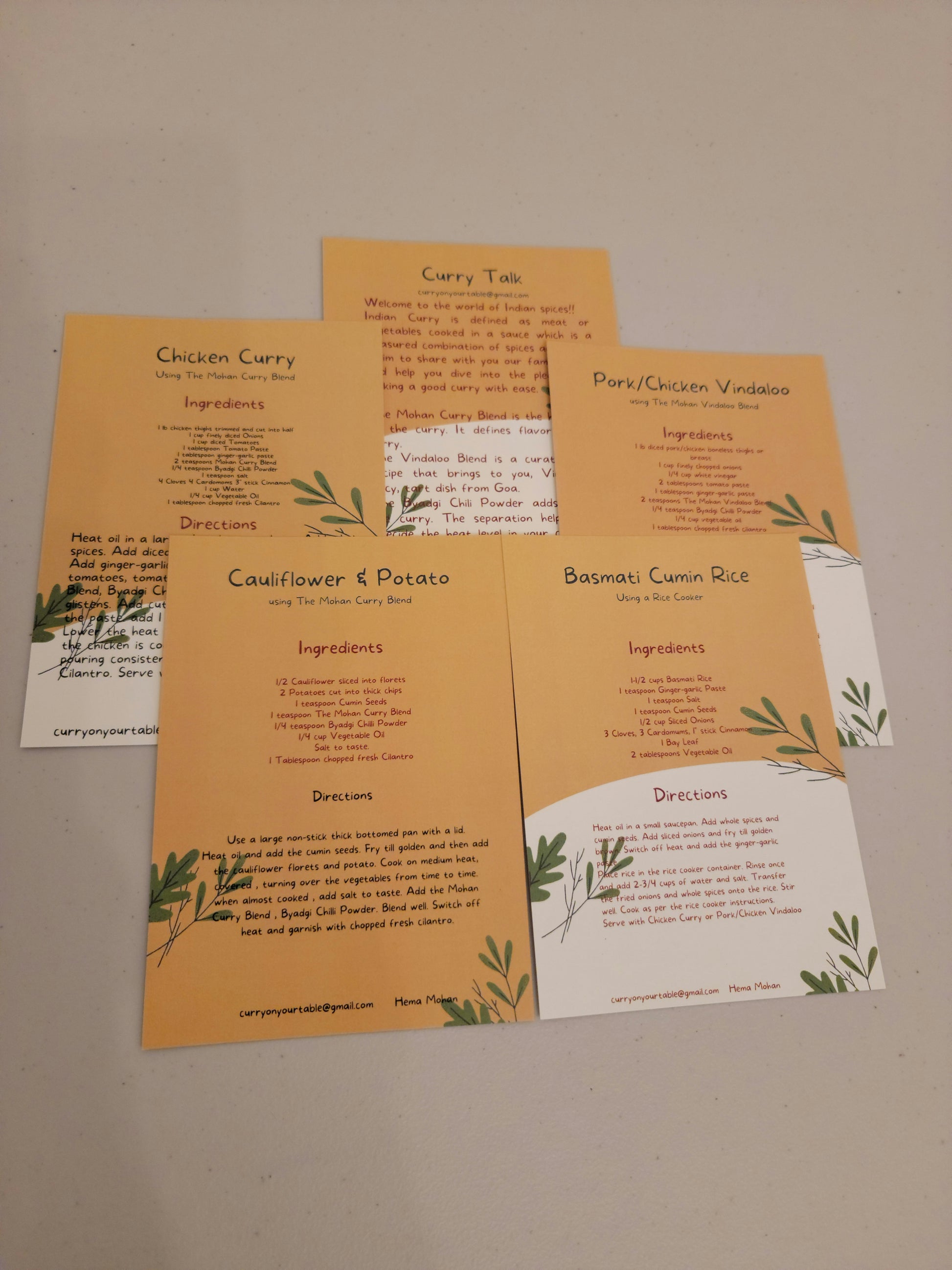 A set of Basic Recipe Cards, handy to keep in your kitchen and help you start using The Mohan Spice Blends with ease.  Set an Indian dinner, the Mohan way!! Combine them with a set of The Mohan Spice Blends for an Ideal gift.